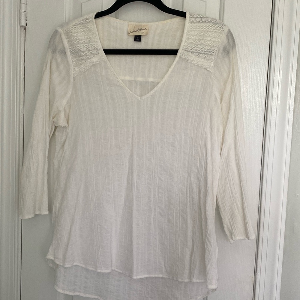 Breezy cream top with mixed texture details